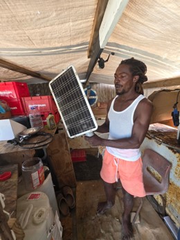 man with solar panel