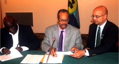 (l-r) Mr. Lindley Simeon Collins, CEO, CAHFSA; Mr. Milton Haughton, Executive Director, CRFM; and Mr. Deryck Omar, CEO, CROSQ sign MoU at Pegasus Hotel in Guyana