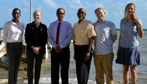 (Left to right) Nadine Nembhard, Administrative Assistant of the Caribbean Network of Fisherfolk Organisations (CNFO); Grace Chun, Deputy High Commissioner at British High Commission based in Belmopan; Milton Haughton, Executive Director of the CRFM, Peter A. Murray, CRFM Programme Manager - Fisheries Management &amp; Development; Paul Buckley, Marine Climate Change Project Coordinator (CEFAS); and Bryony Townhill, Marine Climate Change Scientist at CEFAS