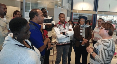 Food safety chemist at Matis Laboratory discusses monitoring procedures with CARIFORUM professionals