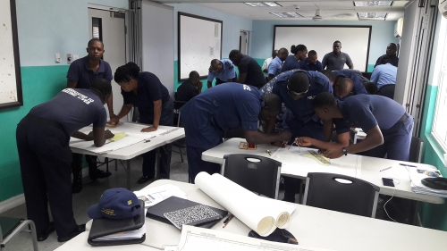 Course participants carrying out practical chart work
