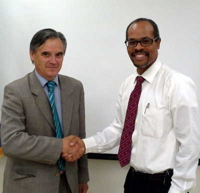 Mr. Eugenio Pössel, Chief Horizontal, Cooperation Department, South-South Program, Chilean Cooperation Development Agency (AGCID) (left) with CRFM Executive Director, Milton Haughton
