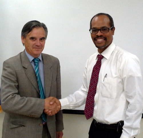 Mr. Eugenio P&ouml;ssel, Chief Horizontal, Cooperation Department, South-South Program, Chilean Cooperation Development Agency (AGCID) (left) with CRFM Executive Director, Milton Haughton