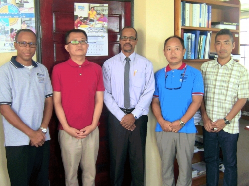 Mikhail Francis, Administrative Assistant for the CARIFICO project; Masaru Honda, Chief Advisor in the Department of Fisheries in St. Lucia; Milton Haughton, CRFM Executive Director; Mitsujiro Ishida, Marine Biologist, based at the Fisheries Division in Antigua and Barbuda; and Minoru Tamura, JICA Expert in fisheries management, based at CRFM in St. Vincent and the Grenadines